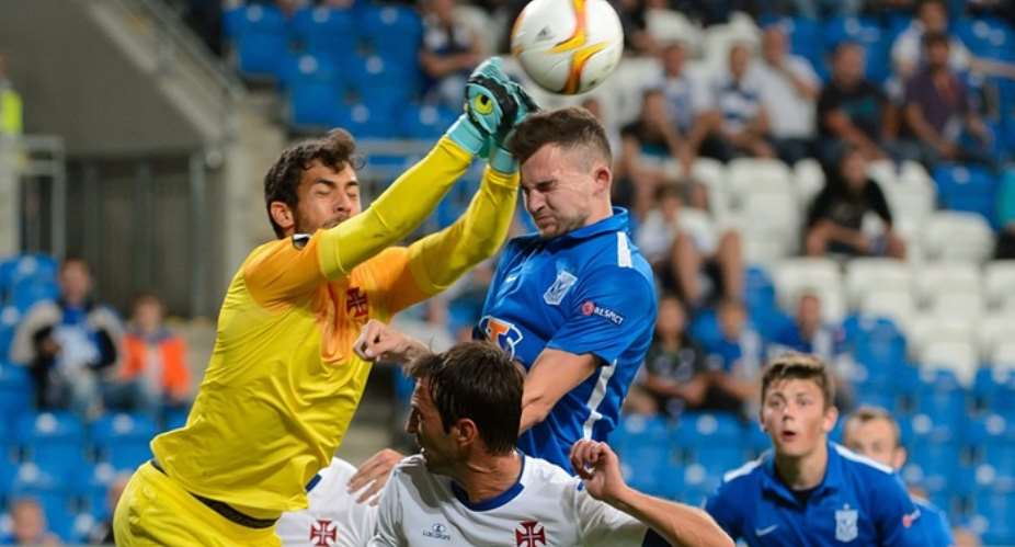 Lech Poznan, who usually play in front of 20,000, take on Belenenses in front of a mass of empty seats at the Inea Stadium. Photograph: Kuba KaczmarczykEPA