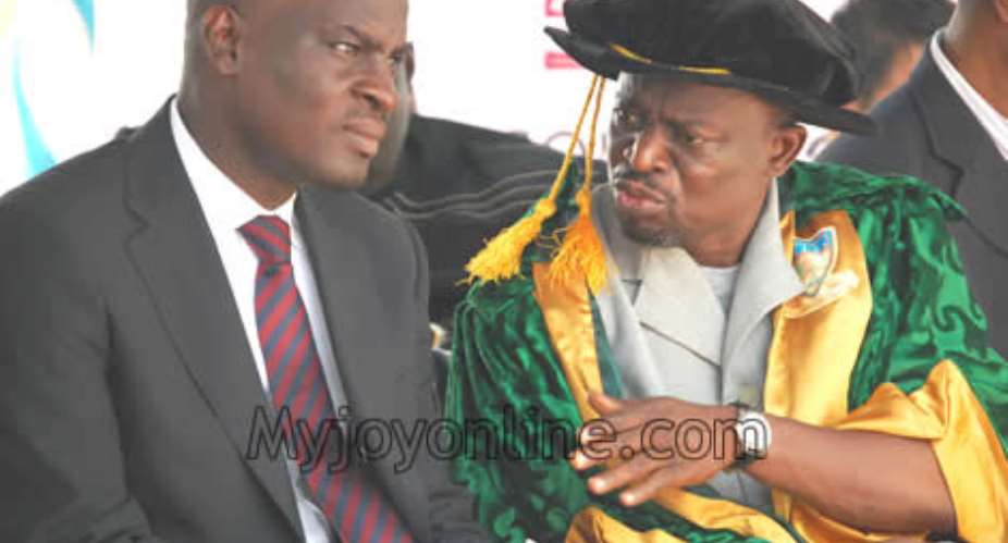 Communications Minister, Haruna Iddrisu, left, in a chat with GIJ Council Chairman, Alhaji A.B.A. Fuseini at the congregation