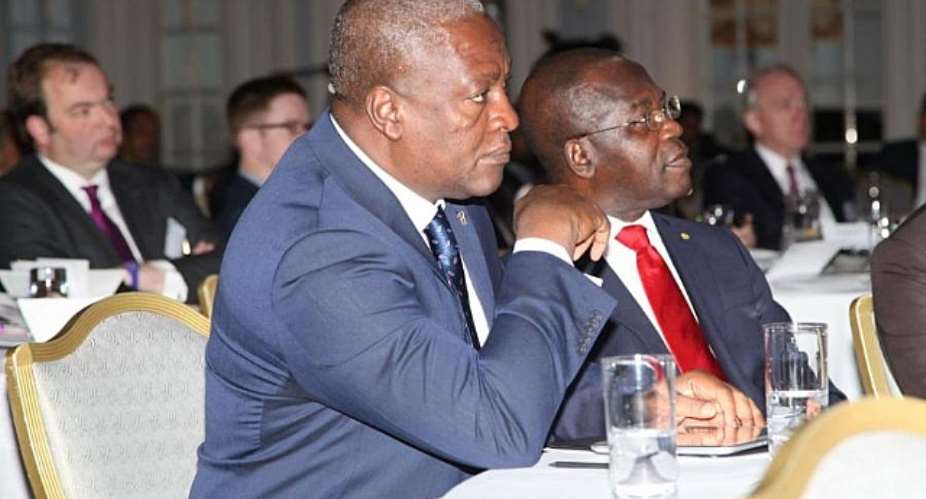 President John Mahama listening to a panel discussing whether the risk of doing business in Africa is increasing