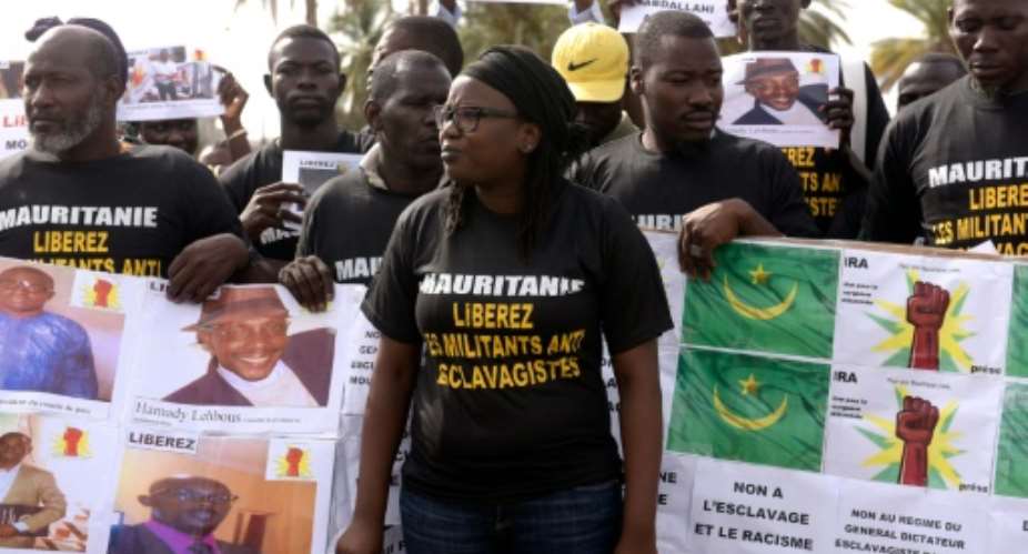 Anti-slavery militants demonstrate in Dakar against the imprisonement of fellow activists in Mauritania.  By Seyllou AFPFile