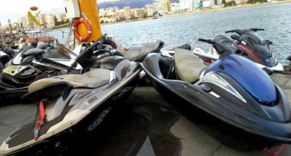 A picture taken on August 22, 2015 by Spanish Guardia Civil and provided on August 29, 2015 shows jet skis parked after being seized by the police off the coast of Tarifa.  By  Spanish Guardia CivilAFP