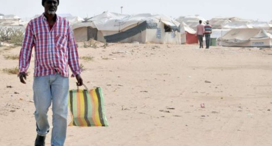 An Ethiopian refugee walks in the refugee camps on April 27, 2012 in Choucha, near the Tunsia-Libya border..  By Khaled Mechergui (AFP/File)