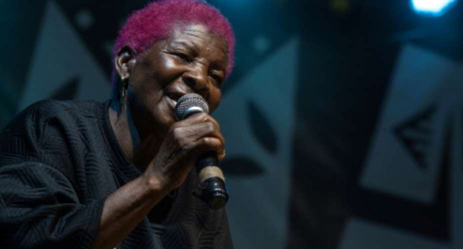 72-year-old Malawian Musician popularly known as Jetu performs on stage during the Tumaini Festival at Dzaleka Refugee Camp in Dowa, central Malawi.  By Amos Gumulira (AFP)
