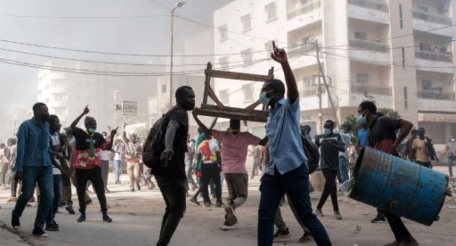 A 23-year-old man died Saturday after being shot during clashes in the capital Dakar, two of his relatives told AFP.  By GUY PETERSON AFP