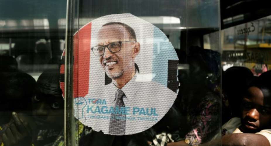 A bus is adorned with an image of incumbent Rwandan President Paul Kagame, expected to win a third election term in Friday's poll.  By MARCO LONGARI AFP