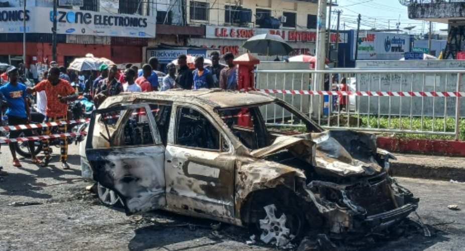 A car ploughed into a crowd of Joseph Boakai's supporters in Liberia on Monday night, killing three.  By EVELYN KPADEH SEAGBEH AFP