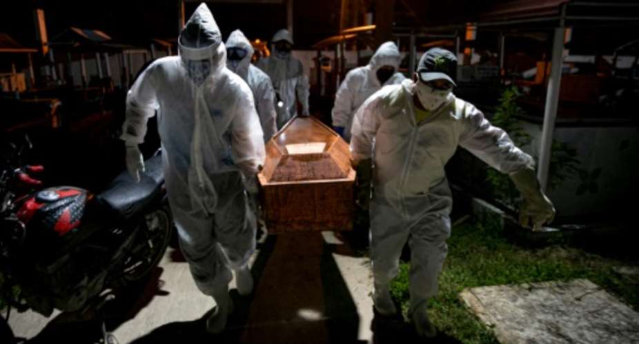 A coffin in Brazil, which has now passed France to have the world's fourth-highest death toll.  By Tarso SARRAF AFP