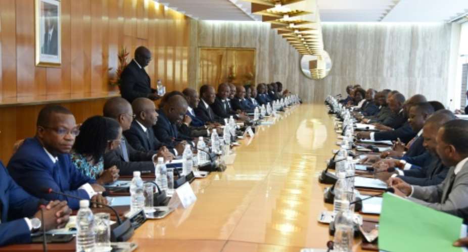 A council meeting of Ivorian President Alassane Ouattara's government on July 11 at the presidential palace in Abidjan.  By SIA KAMBOU AFP