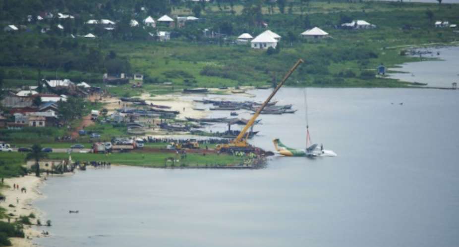 A crane removes the crashed Precision Air aircraft from  Lake Victoria at Bukoba, Tanzania.  By SITIDE PROTASE AFP