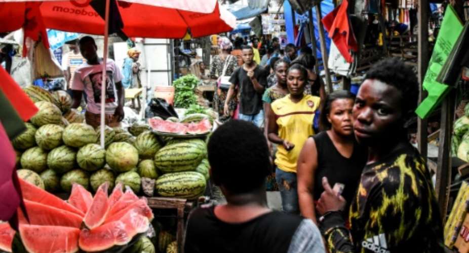 A crowded market in Dar es Salaam, pictured last week.  By Ericky BONIPHACE AFP