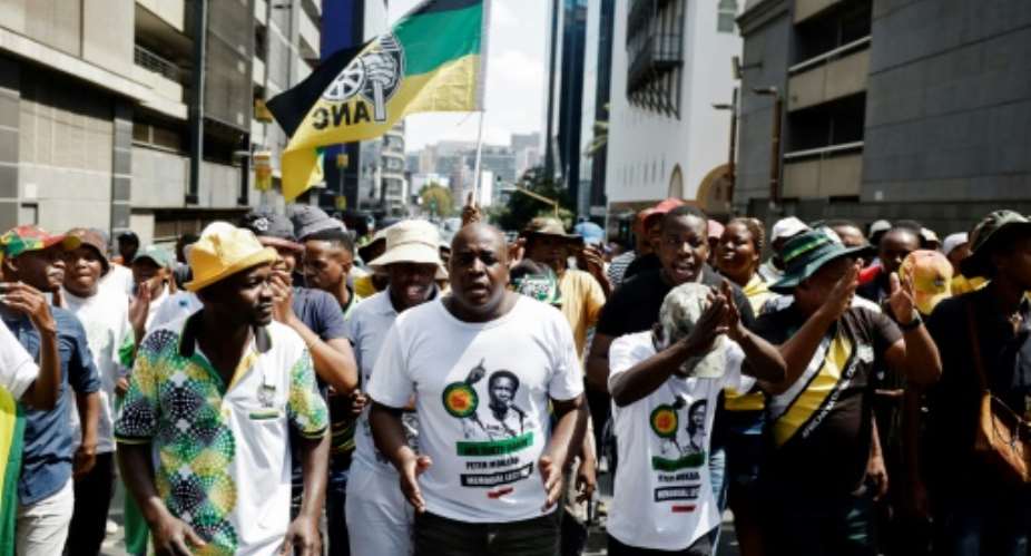 A few hundred ANC supporters gathered at the party's headquarters for a counter-demonstration.  By Marco LONGARI AFP