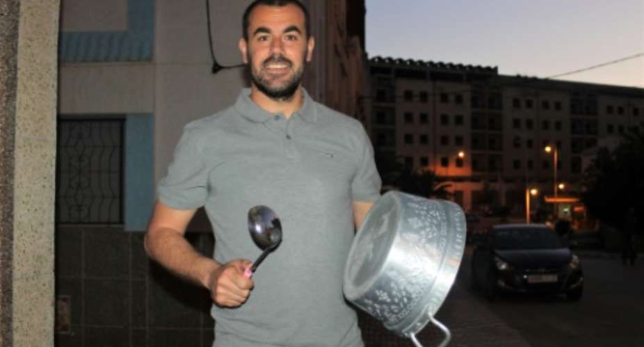 A file photo taken on May 06, 2017 shows Moroccan activist Nasser Zefzafi banging on a pot during a protest in the northern city of Al-Hoceima.  By Mohamed el-Asrihi AFPFile