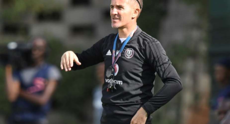 A file picture of Serbian Milutin 'Micho' Sredojevic coaching South African club Orlando Pirates two years ago..  By STRINGER AFP