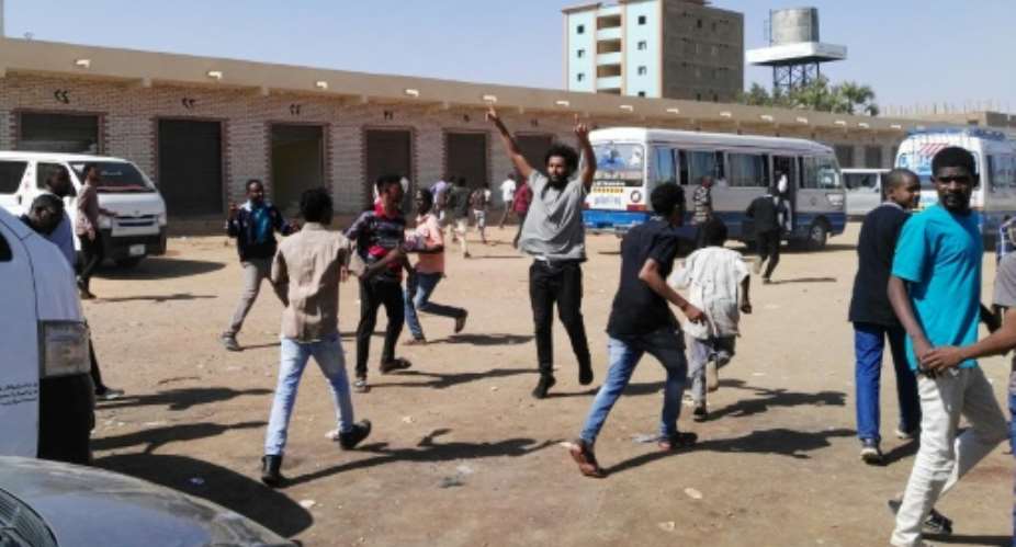 A file picture taken on January 13, 2019 shows anti-government demonstrators in the Sudanese capital Khartoum.  By STRINGER AFPFile