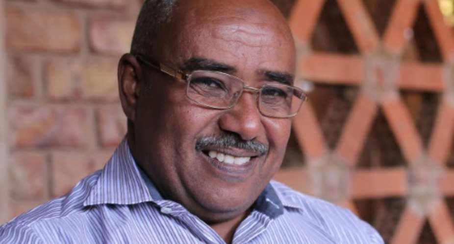 A file picture taken on January 3, 2016 in the Sudanese capital Khartoum shows AFP journalist Abdelmoneim Abu Idris Ali, 51, who has been freed following his arrest while covering protests.  By Tom LITTLE AFP