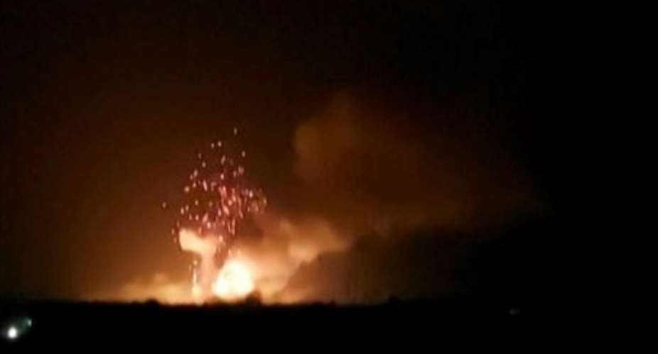 A fire erupted at a military ammunition depot in the Chadian capital, sending powerful explosions into the night sky.  By - (Mahamat Djiddi Hassan/AFP)