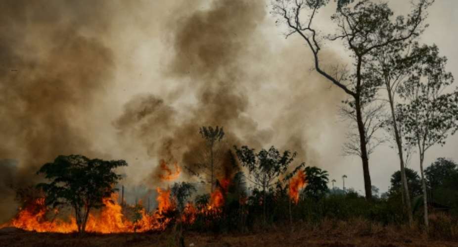A forest fire Brzails Amazonas state, which recorded nearly four times more fire hotspots this September than the year before.  By MICHAEL DANTAS (AFP/File)