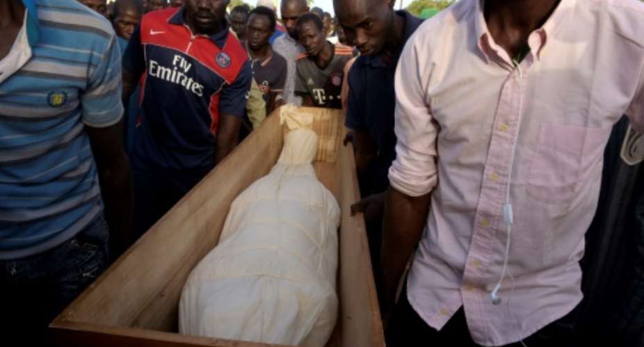 A funeral for one of 14 young men killed in Casamance on January 6 in a massacre linked to the illegal timber trade which has prompted a Senegalese crackdown on logging.  By SEYLLOU AFPFile