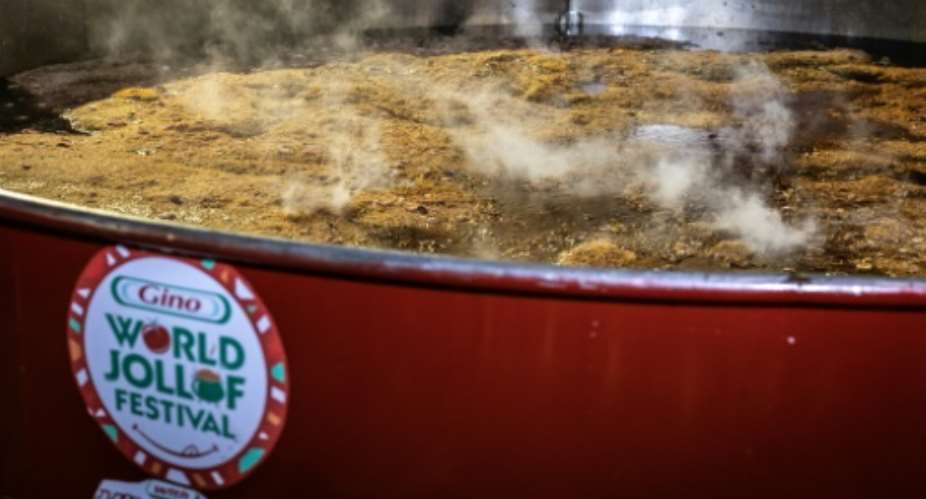 A giant pot containing almost nine tonnes of jollof rice has earned Nigerian chef Hilda Baci a world record.  By OLYMPIA DE MAISMONT (AFP)