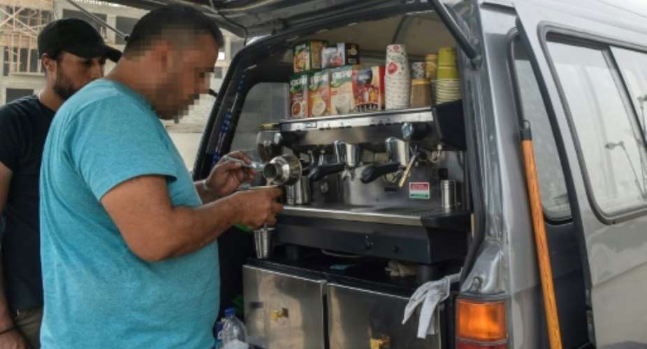 A growing number of Syrian drinks pedlars are exploiting a niche in the Cairo market, albeit an illegal one, by selling hot drinks from mobile vans.  By Mohamed el-Shahed AFP