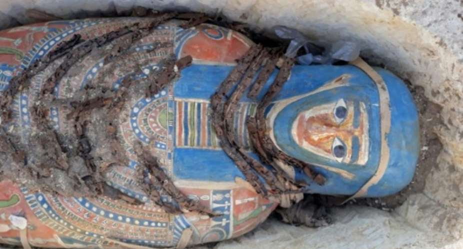 A handout picture released by the Egyptian Ministry of Antiquities on November 28, 2018 shows one of the newly-uncovered mummies.  By - Egyptian Ministry of AntiquitiesAFP