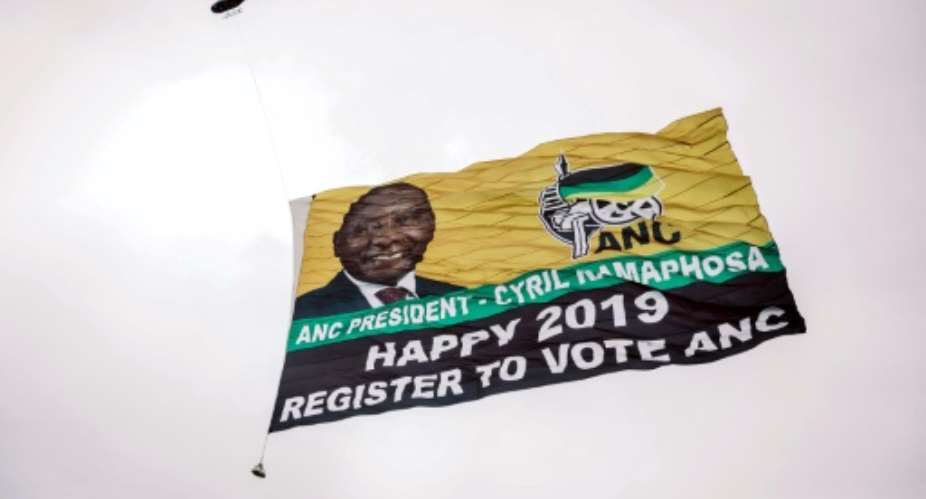 A helicopter displaying a picture of South African president Cyril Ramaphosa on Sunday urged people to register to vote in upcoming elections.  By RAJESH JANTILAL AFPFile