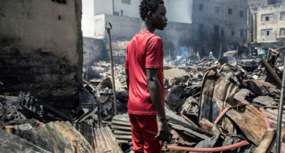A huge blaze burnt the wood market to the ground in Senegal's Dakar.  By JOHN WESSELS AFP