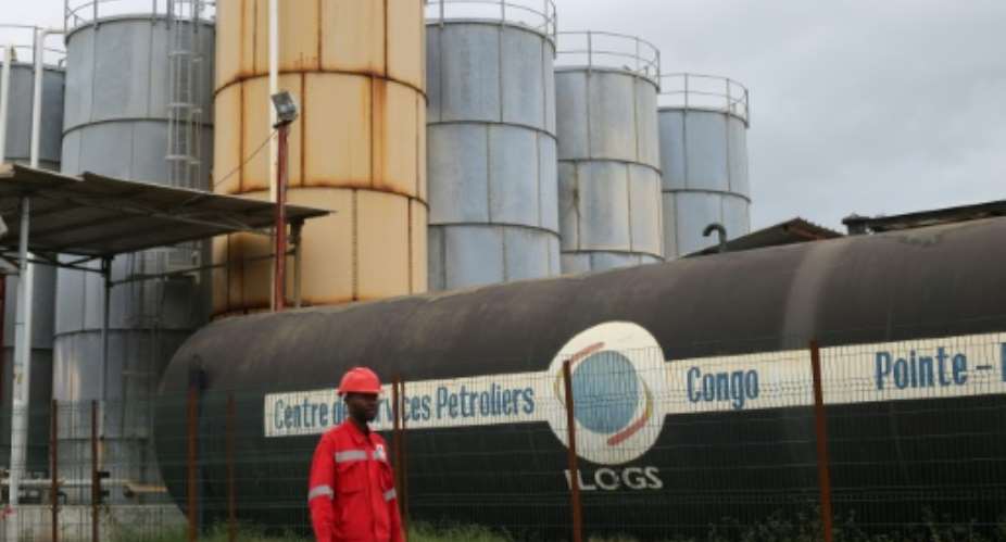 A huge chunk of Congo's oil revenue goes to to pay off debts.  By SAMIR TOUNSI AFPFile