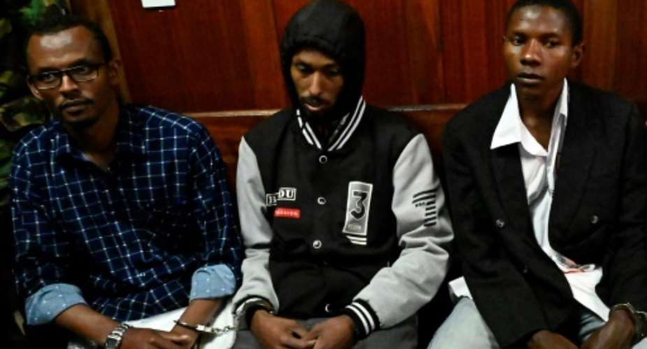 A Kenya court handed Hassan Aden Hassan, left, Mohamed Ali Abikar and Rashid Charles Mberesero long sentences for abetting the 2015 Garissa University attack.  By SIMON MAINA AFP