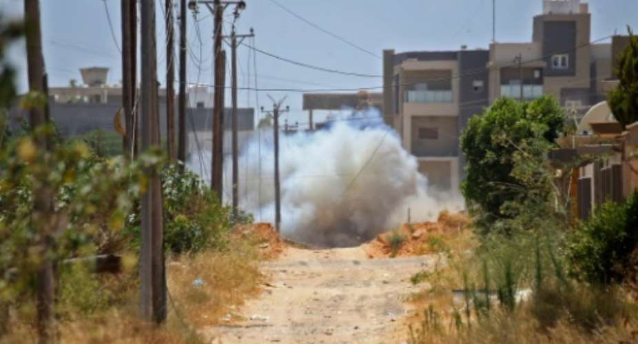 A landmine is exploded during Turkish demining operations in the Salah al-Din area, south of the Libyan capital Tripoli on June 15, 2020.  By Mahmud TURKIA AFPFile