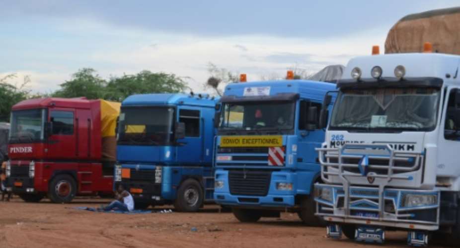 A long line of lorries from Niger and elsewhere in West Africa is stranded at Dan Issa after Nigeria closed its borders.  By BOUREIMA HAMA AFP