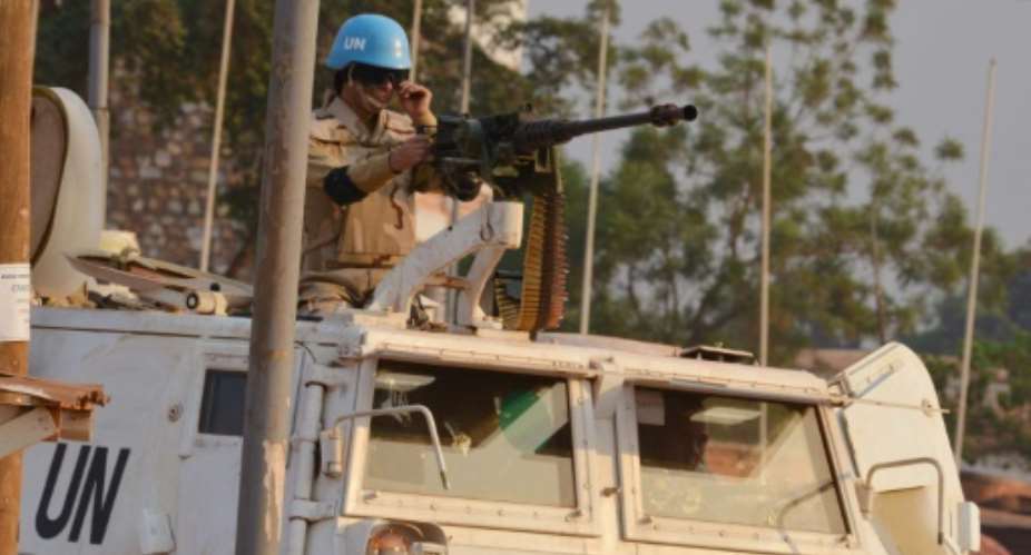 A Moroccan peacekeeper from the United Nations Mission in the Central African Republic MINUSCA  patrols in Bangui on December 24, 2015.  By Issouf Sanogo AFPFile