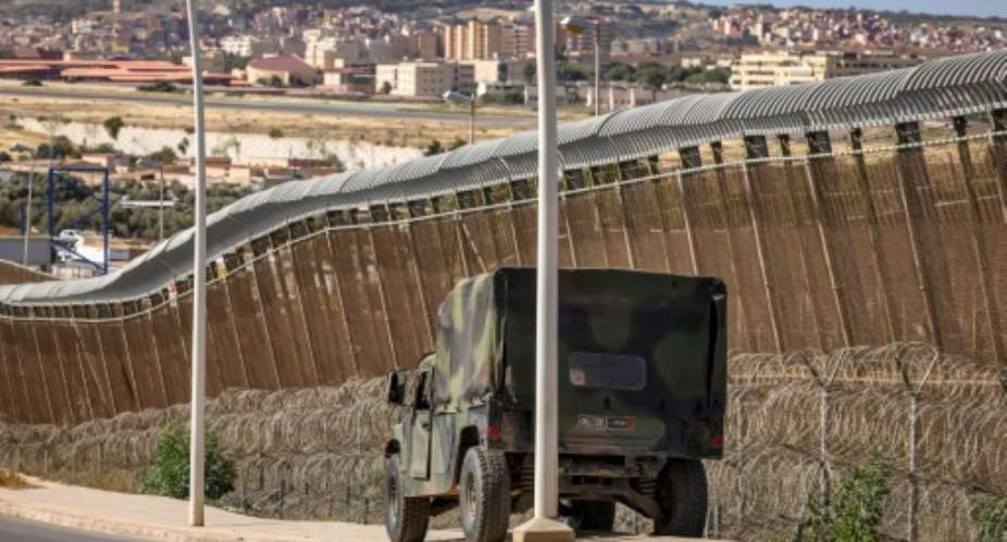 A Moroccan security forces vehicle posted at the border fence separating Morocco from Spain's Melilla enclave.  By FADEL SENNA AFP
