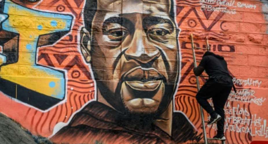 A mural of George Floyd, whose US police killing has sparked worldwide protests against police brutality, in Nairobi's Kibera slum.  By Gordwin ODHIAMBO AFPFile