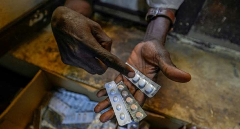 A person receives free medication in Sudans capital. In Blue Nile to the south, displaced people have reported shortages of medicine and food.  By Khaled DESOUKI (AFP)