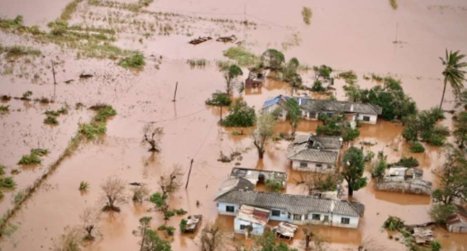 A picture shows houses in a flooded area of Buzi, central Mozambique after the passage of cyclone Idai..  By Adrien BARBIER AFP