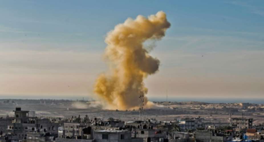 A picture taken in from Rafah in the southern Gaza Strip shows smoke billowing following an explosion close to the border on the Egyptian side of the divided city.  By SAID KHATIB AFPFile
