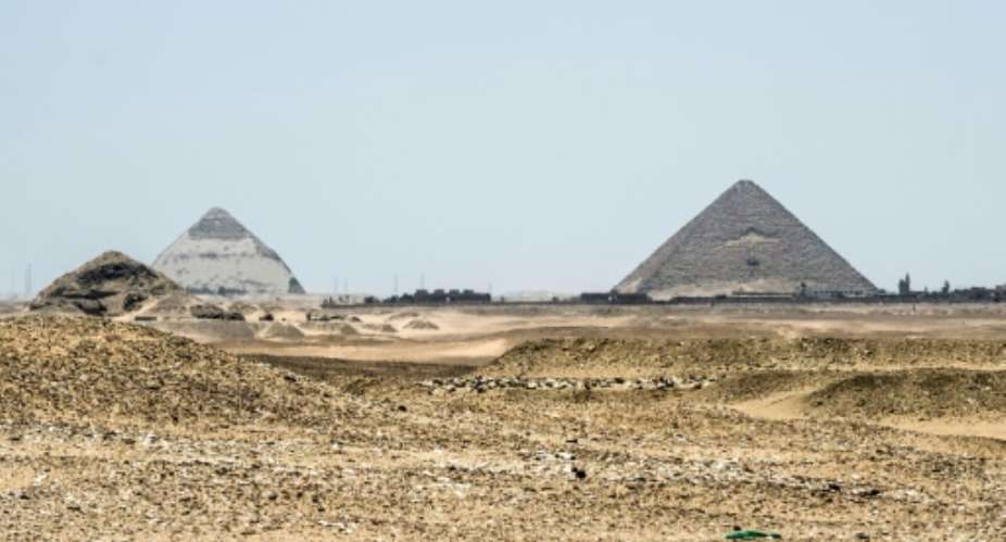 A picture taken on July 14, 2018 shows a general view of the Saqqara necropolis south of Cairo where Egyptian antiquities officials say a new tomb belonging to a high priest and dating back more than 4,400 years.  By Khaled DESOUKI AFPFile