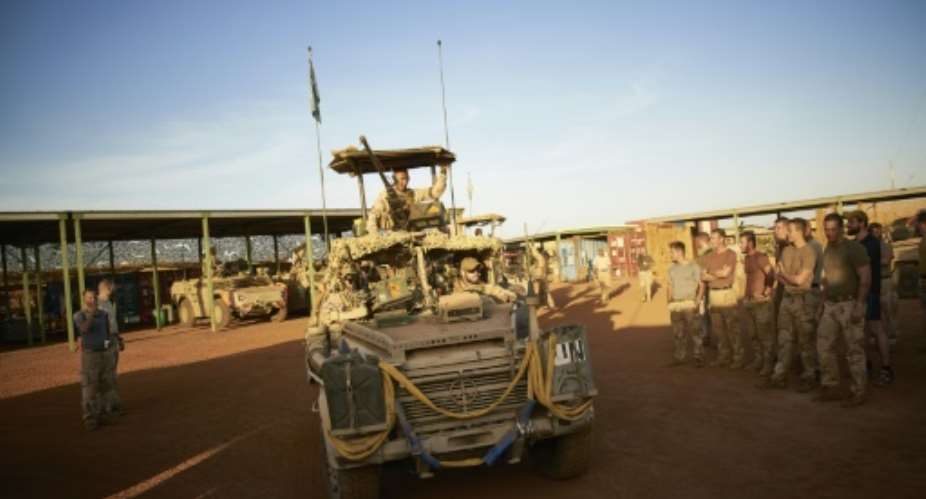 A picture taken on November 29, 2017 shows Dutch soldiers of the MINUSMA United Nations Multidimensional Integrated Stabilization Mission in Mali contingent at their base in Gao, Mali.  By MICHELE CATTANI AFPFile