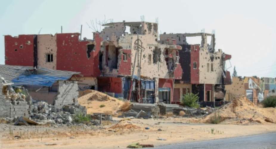 A residential building damaged during months of fighting between the UN recognised government and forces of Khalifa Haftar, in a southern neighbourhood of the capital Tripoli on July 9, 2020.  By Mahmud TURKIA AFPFile
