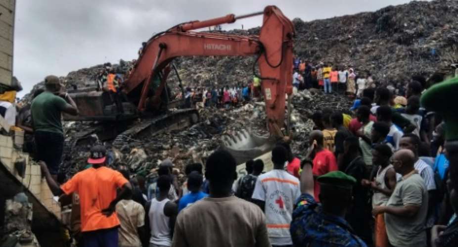 A search was ongoing at the site of the landfill collapse.  By - (AFP)