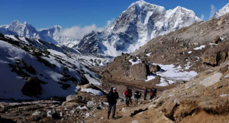 A South African who attempted to climb Mount Everest without permission has been arrested in Nepal where he faces a 22,000 fine -- double the cost of the permit he was trying to avoid.  By ROBERTO SCHMIDT AFPFile