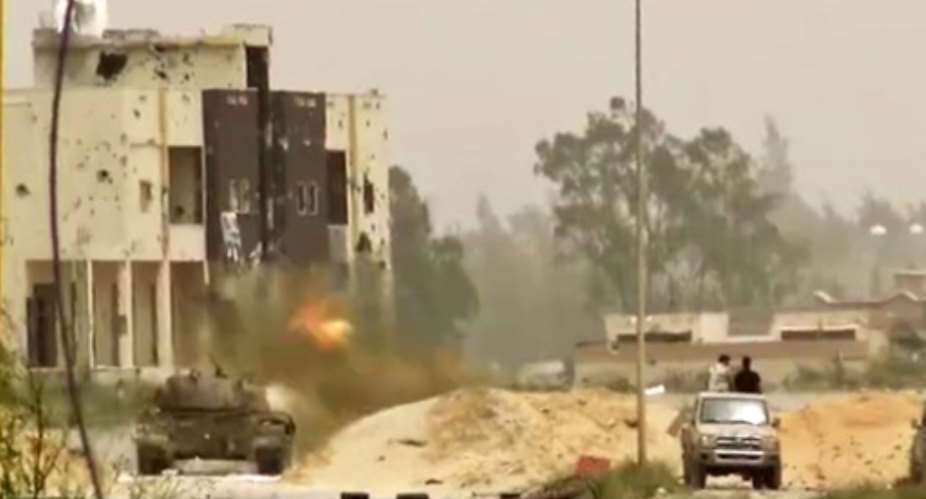 A tank in clashes on the outskirts of the Libyan capital Tripoli.  By - LNA War Information DivisionAFP