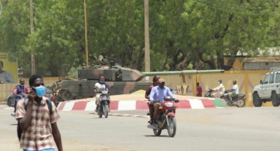 A tank positioned at a roundabout in Chad's capital N'Djamena on Monday.  By - AFP