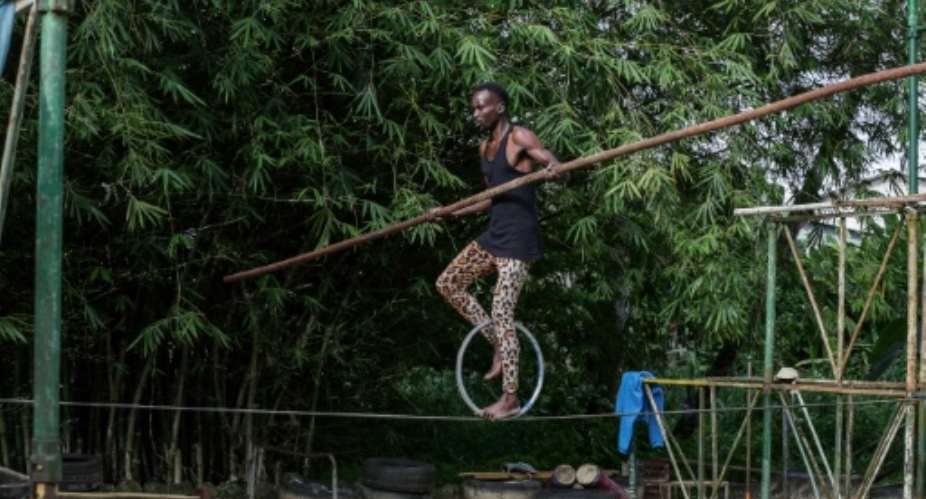 A tightrope-walker with Le Cirque de l'Equateur, Gabon's only circus, which has fallen on hard times.  By Steeve Jordan AFP