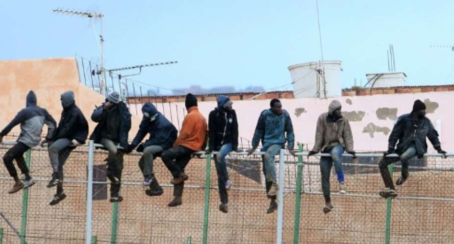 A total of 208 migrants entered Melilla on Sunday after climbing over two barbed wire fences which separate the tiny territory from northern Morocco.  By ANGELA RIOS AFPFile