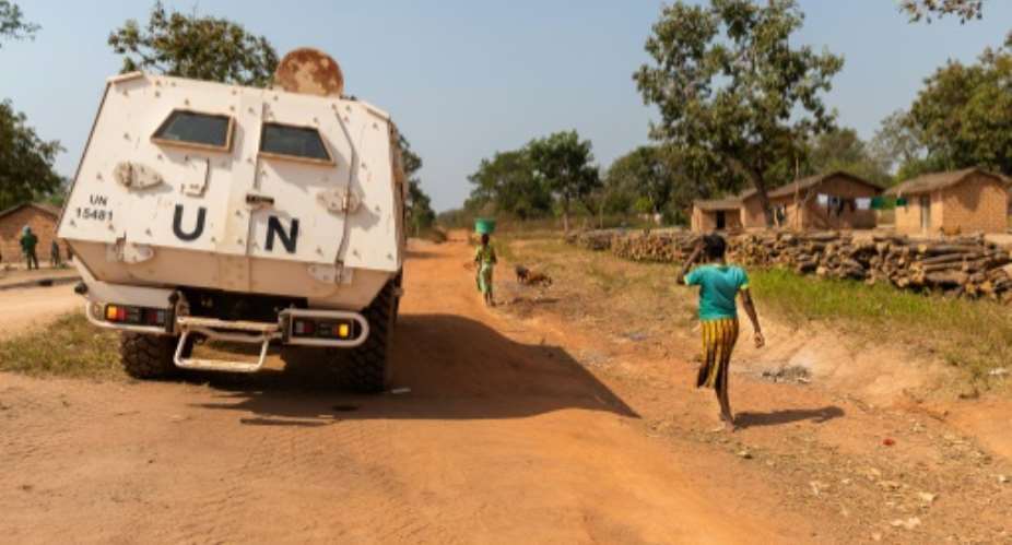 A UN armoured personnel carrier patrols on a supposedly safe road, avoiding potentially mined roads which have posed a growing threat to locals in recent months.  By Barbara DEBOUT AFP