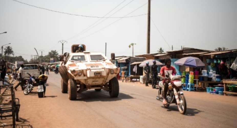 A UN vehicle patrols in Bangui in January 2020.  By FLORENT VERGNES AFPFile