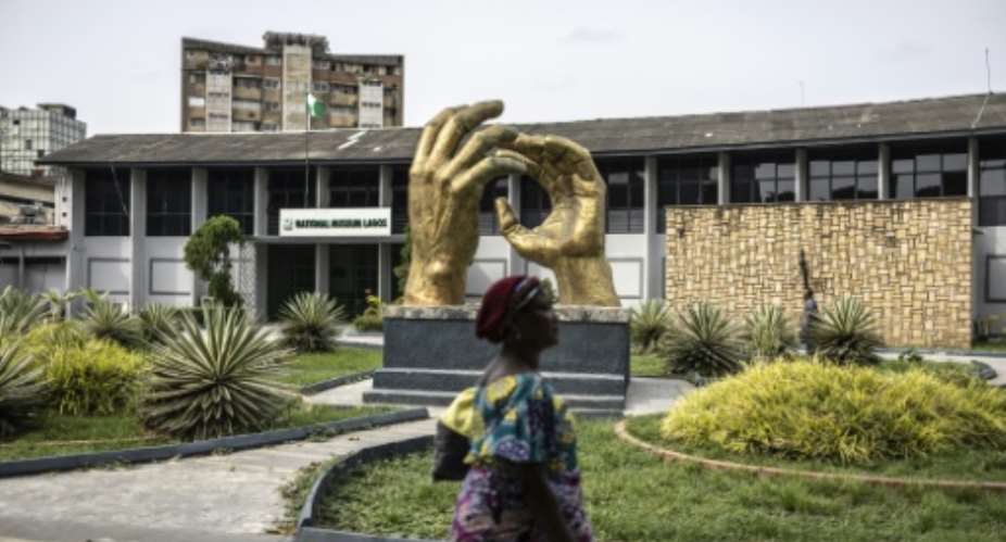 A visitor walks past the National Museum in Lagos on April 23, 2026.  By OLYMPIA DE MAISMONT (AFP)