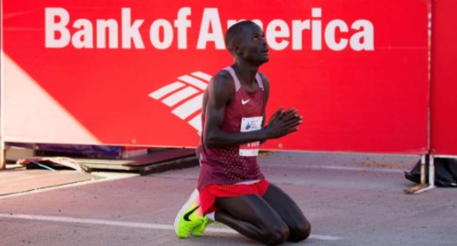 Abel Kirui celebrates after winning the Chicago Marathon.  By Tasos Katopodis GettyAFP
